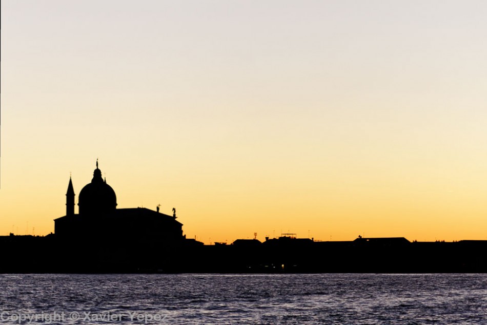 A silhouette of a church in a sunset, Venice, Italy