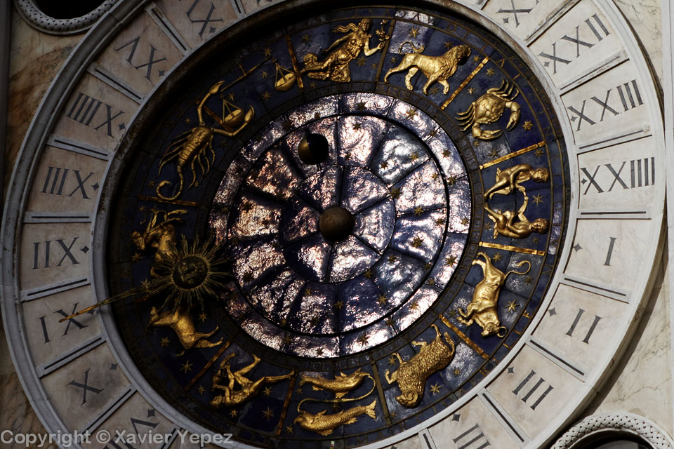 Detail of the clock on the left side of Piazza San Marco, Venice, Italy